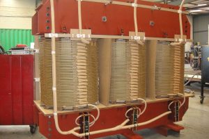 Voltage step-up power transformer during construction. 690V : 33kV; 4MVA; YNd1