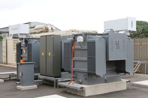 Two 4MVA voltage step-up transformers together with outdoor protection relay assembly and Neutral Earth Resistor ground reference. Voltage step-up ratio is 400V:11kV